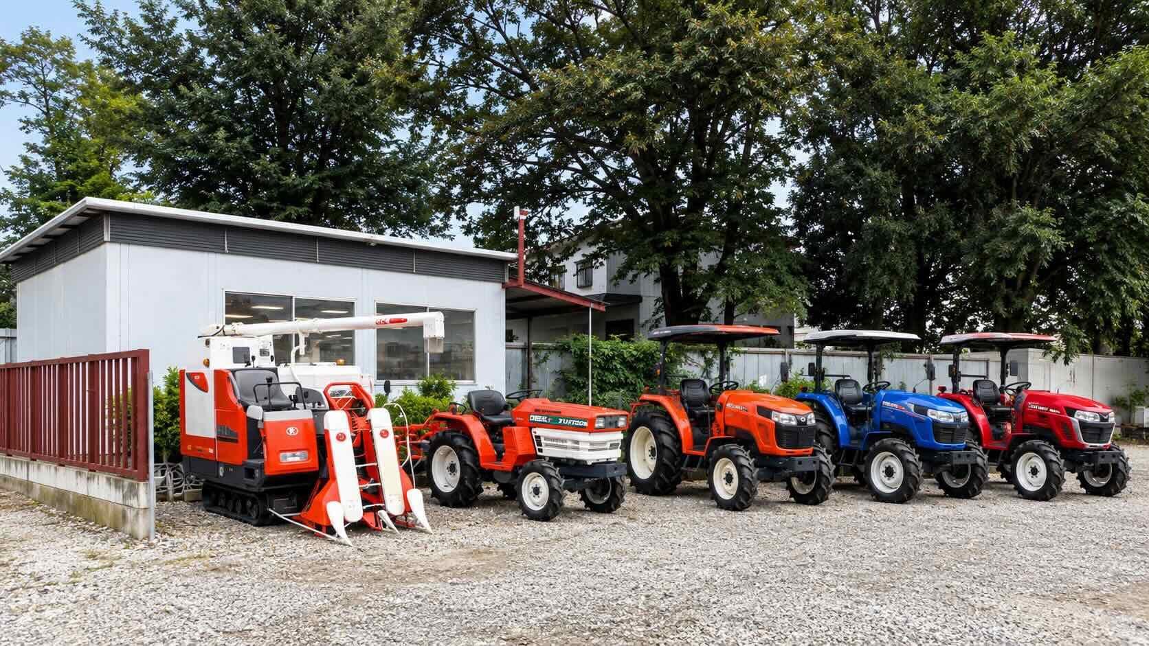 Tractors and a combine harvester on display at the TopMachine.Lk showroom yard